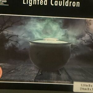 Choose one USB operated Witch pot or skull head